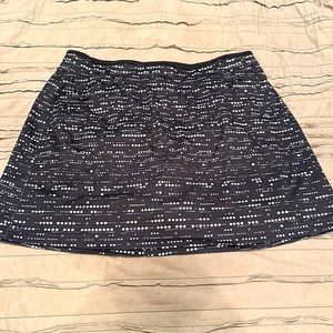 Large women’s athletic skirt with sewn in shorts. Quick dry material, drawstring